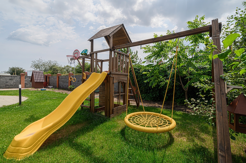 PVC vs Wooden Playsets: Which Is Better for Long Island Weather?